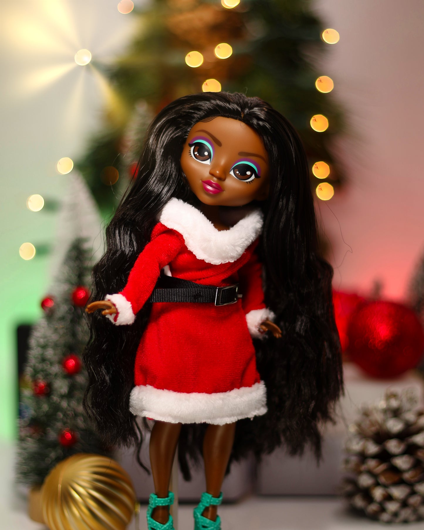 Doll in a red outfit with a festive background