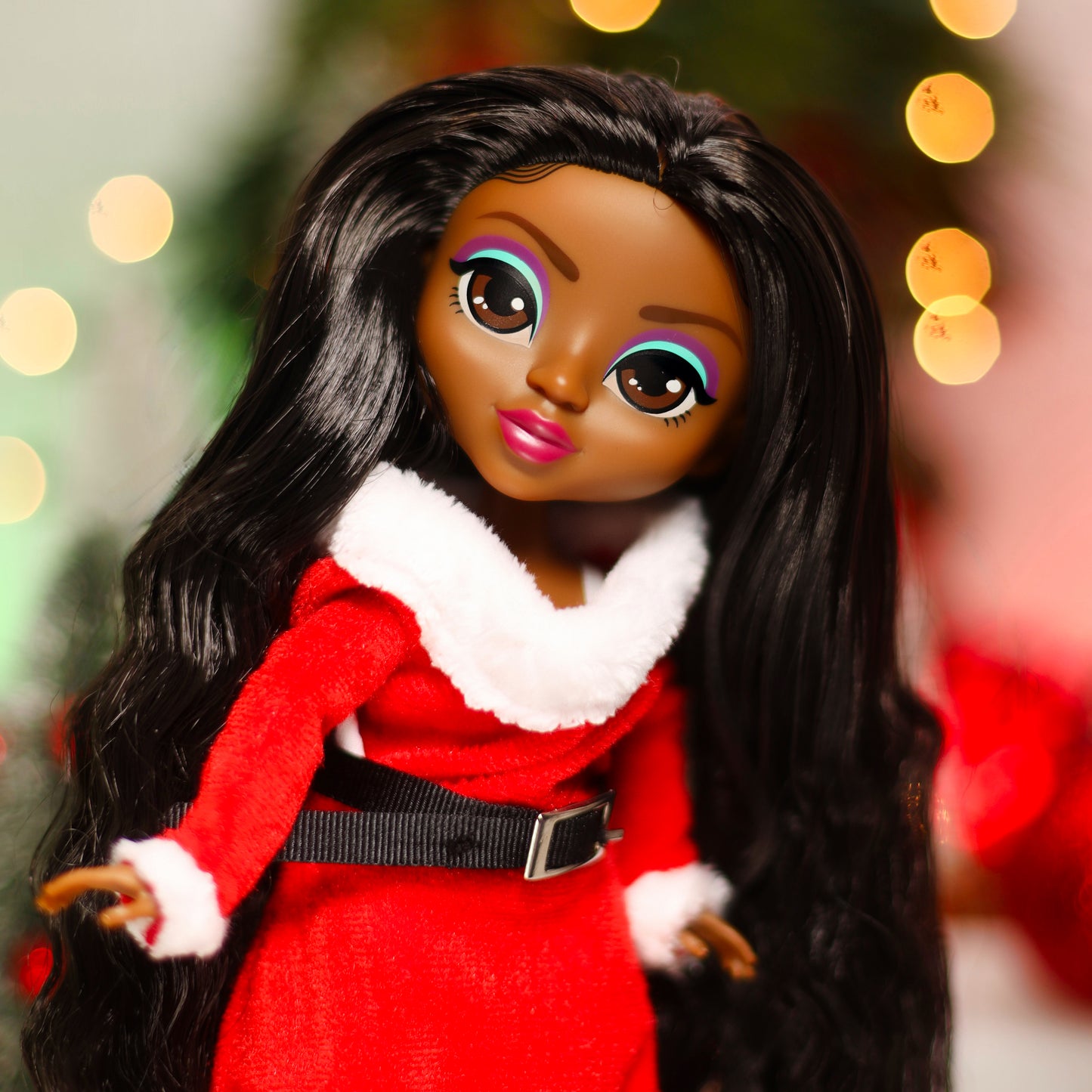 Doll in a red outfit with a white collar against a festive background