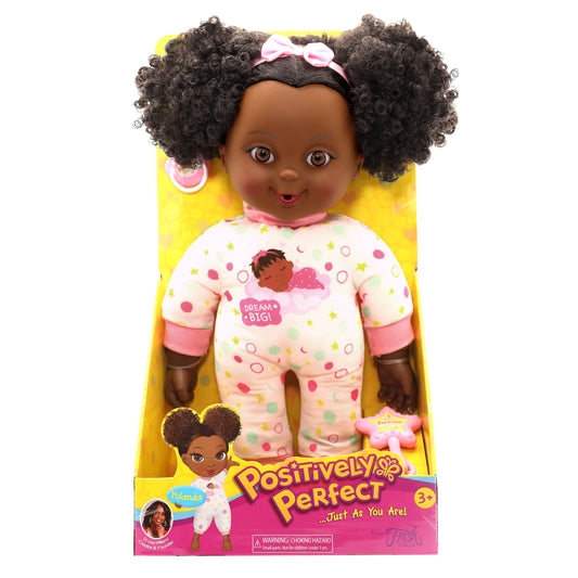 Close-up of African American doll Yolanda with sweet smile and pink bow