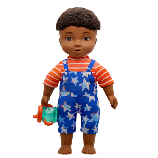 Toy doll with a striped shirt and star-patterned overalls on a white background