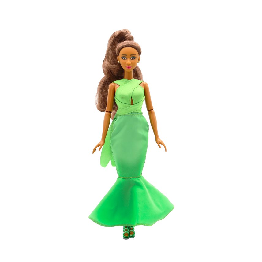 A doll with long brown hair, wearing a green dress and matching green shoes, with 9 points of articulation.