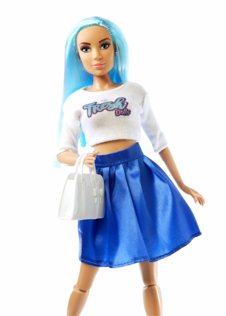 Up close blue haired fashion doll wearing white top with sleeves and blue skirt holding white purse
